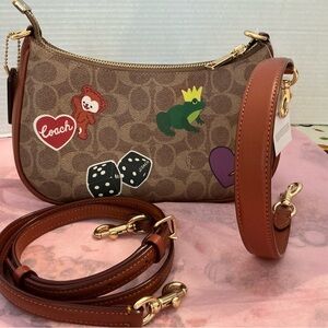 NWT Coach CV939 Teri Shoulder Bag in signature canvas with Rexy Sticker Print